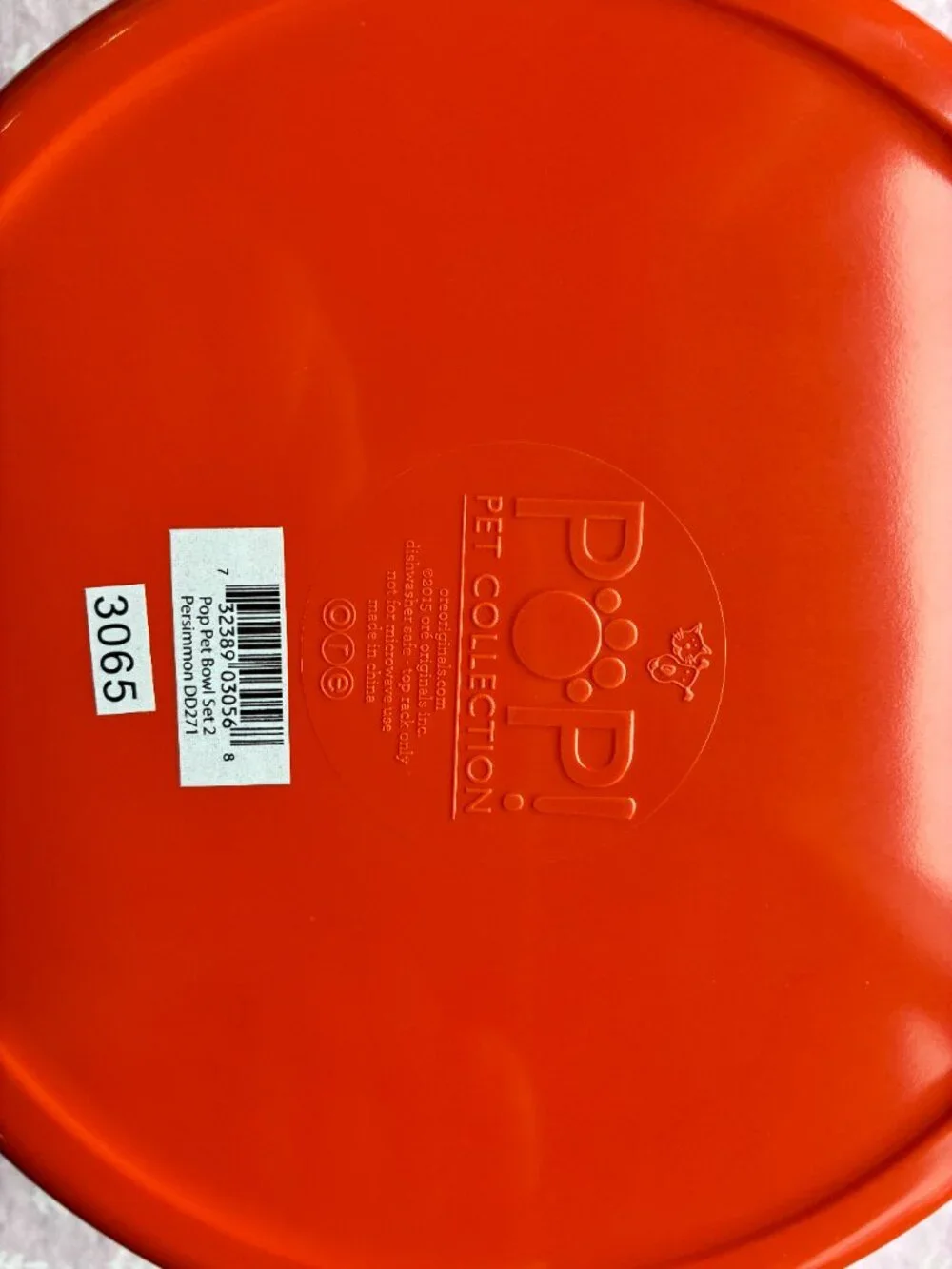 Set of orange dog bowls by Ore Originals. NWT